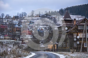 Old Historical Wooden houses in the Carpathian mountains at Winter. Vorokhta, Ukraine