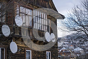 Old Historical Wooden houses in the Carpathian mountains at Winter. Vorokhta, Ukraine