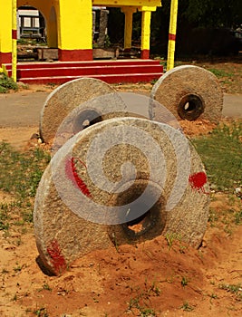 Old holy cart-ratha- stone wheels. photo
