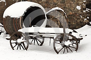 Old horse drawn carriage in the snow