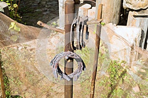 Old horseshoes on the steak in the smithy