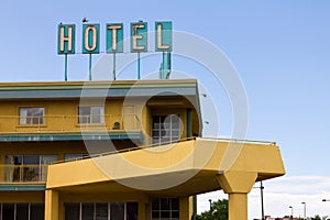 Old Hotel Sign Above Highway Motel