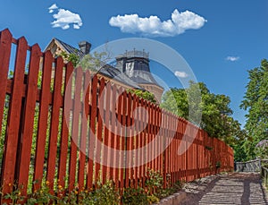 Old hous with red fence in Stockholm. Sodermalm district. Sweden.