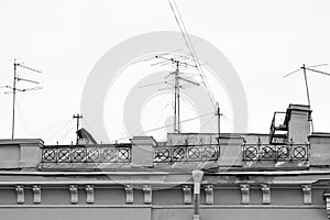 Old house with chimneys and television antennas