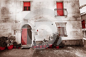 Old house facade. Vintage color. Red isolated.