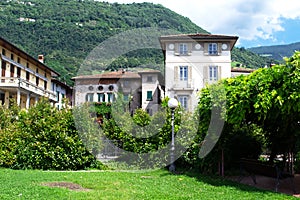 Old house among the greenery in the city of Pisogne