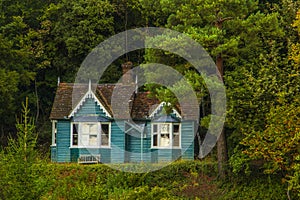 Old house in the middle of trees