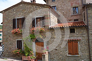 Old house of Palazzo del Pero, Tuscany, Italy photo