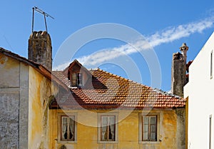 An old house in Sintra, Portugal, with tile roof and garret photo
