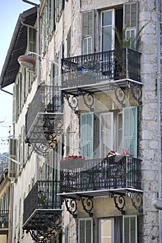 Old house with small french balconies, France