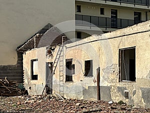 Old house under demolition in the city