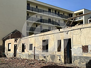 Old house under demolition in the city