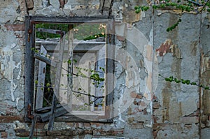 Old house in a village with a broken wooden window.Copy space