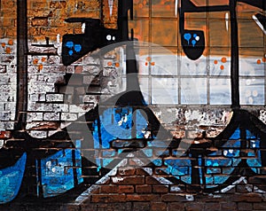 Old house wall with graffiti