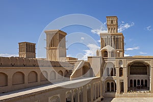 Old house with wind towers in Abarkuh, Iran