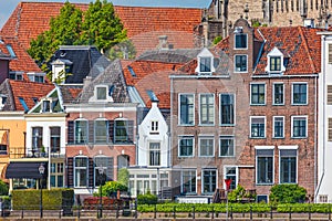 Old houses alongside the river IJssel in Deventer, The Netherlands photo