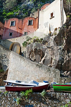 Old houses and boats on the beach of Furore, Amalfi coast, Italy photo