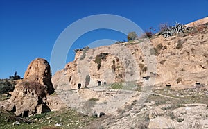 Old houses carved amid the mountains in the city Fez Morocco