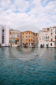 Old houses on Grand Canal, Venice, Italy. Vintage hotels and residential buildings in the Venice center. Historical