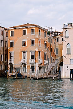 Old houses on Grand Canal, Venice, Italy. Vintage hotels and residential buildings in the Venice center. Historical