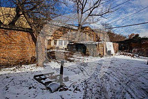 Old houses on low-rise street in old poverty part of Rostov-on-Don city in Russia