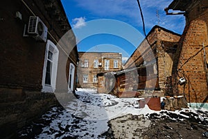 Old houses on low-rise street in old poverty part of Rostov-on-Don city in Russia