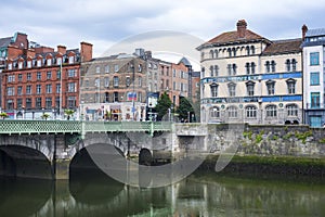 Old houses on a quay river in the historical center of Dublin