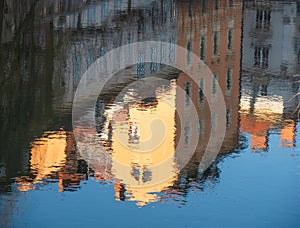 Old houses reflection in water of canal. Famous european town. Ljubljana city architecture, Slovenia. Waterfront scene.