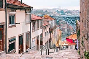 Old houses and stairs in Ribeira, Porto, Portugal photo