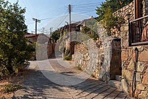Old houses at the street of the ancient village Gourri