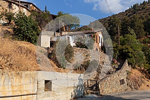 Old houses at the street of the ancient village Gourri