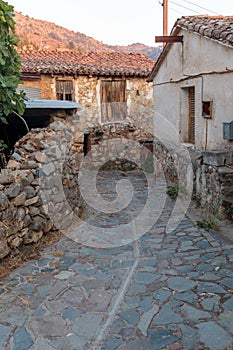 Old houses at the street of the ancient village Gourri