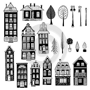 Old houses and trees, lanterns and bushes.