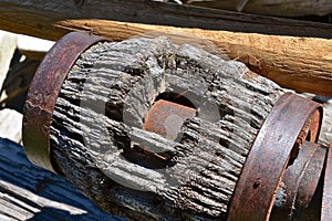 Old hub of a wood wagon wheel