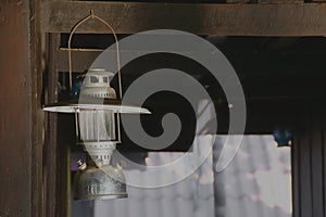 OLd Hurricane Storm Lantern, Kerosene Lamp Hanging on Wooden Beam