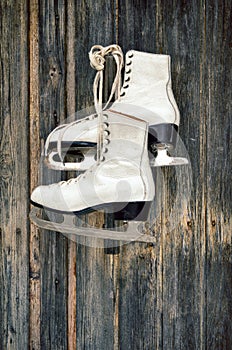 Old ice skates on wall