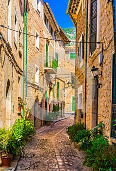 Mediterranean beautiful street alley in old village on Majorca island, Spain
