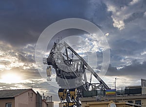 old II world war german cruiser builder iron crane detail close up in Genoa harbor Italy