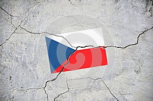 An old image of the flag of Czech Republic on a wall with a crack