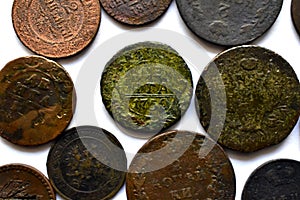Old Imperial Russian coins on a white background Translation: Kopeck, kopeck in silver