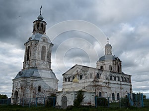 Old inactive church against a dramatic sky