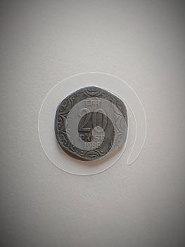 Old  Indian 20 Paise Coin On White Background