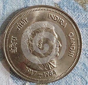 Old indian coin prime minister Indira Gandhi in coin photo
