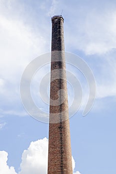 Old industrial brick chimney