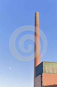 Old industrial brick chimney