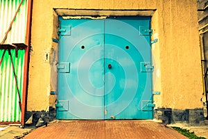 Old industrial building, a closed elevator door