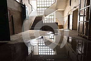 Old industrial building interior, windows, staircases