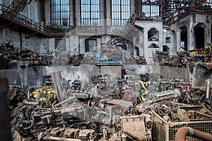 Old industrial building with truck engines