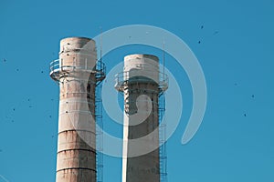 Old industrial chimneys in Monopoli, Italy.