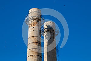 Old industrial chimneys in Monopoli, Italy.